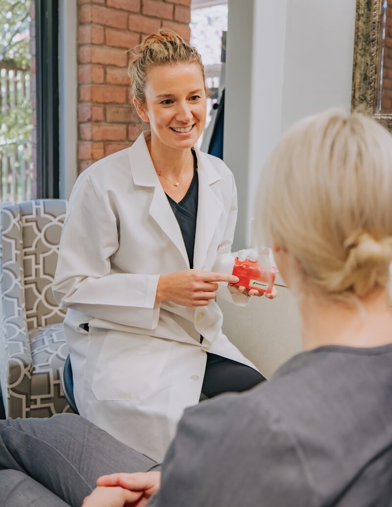 a person in a white coat